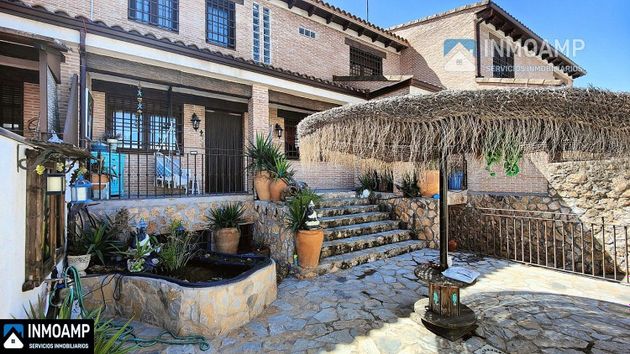 Foto 1 de Casa en venda a calle Extremadura de 9 habitacions amb terrassa i garatge