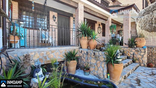 Foto 2 de Casa en venda a calle Extremadura de 9 habitacions amb terrassa i garatge