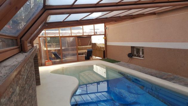 Foto 1 de Casa en venda a Pedrezuela de 3 habitacions amb terrassa i piscina