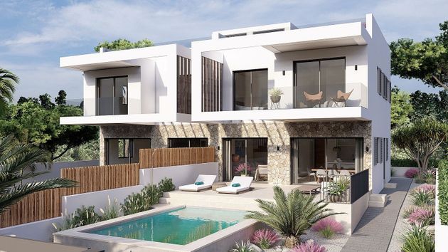 Foto 1 de Casa adossada en venda a Badia Blava-Badia Gran-Tolleric de 3 habitacions amb terrassa i piscina