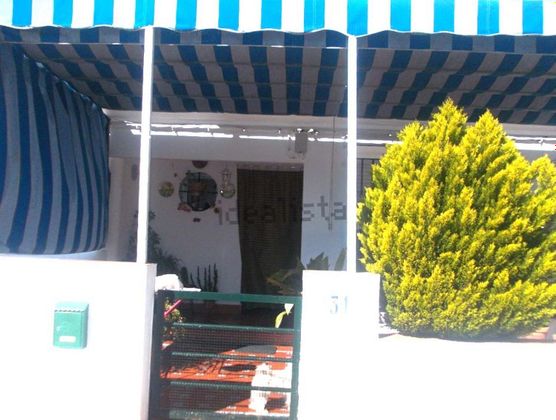Foto 1 de Casa adosada en venta en urbanización Las Banderas III de 4 habitaciones con terraza y piscina