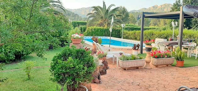 Foto 1 de Chalet en venta en Simat de la Valldigna de 3 habitaciones con terraza y piscina