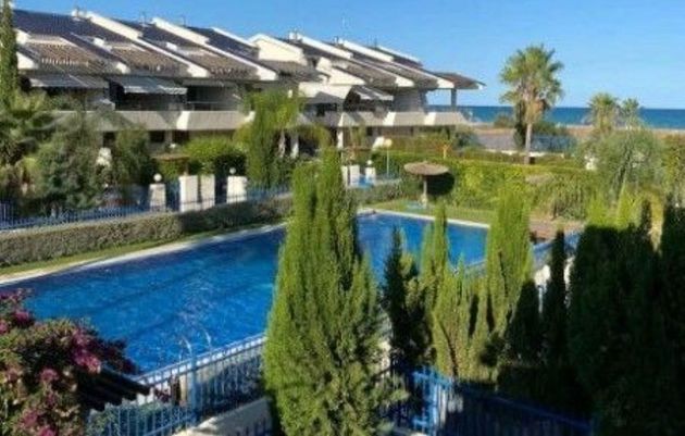 Foto 1 de Venta de casa adosada en Almardà de 3 habitaciones con terraza y piscina