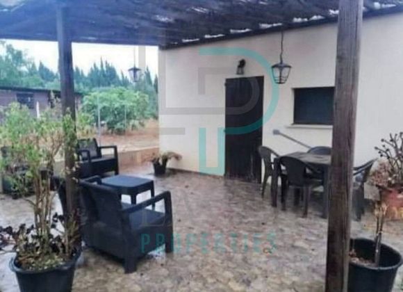 Foto 1 de Venta de casa rural en Pobla (Sa) de 2 habitaciones con piscina y jardín