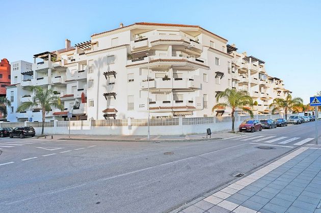 Foto 1 de Piso en venta en Playa de Granada de 3 habitaciones con terraza y piscina