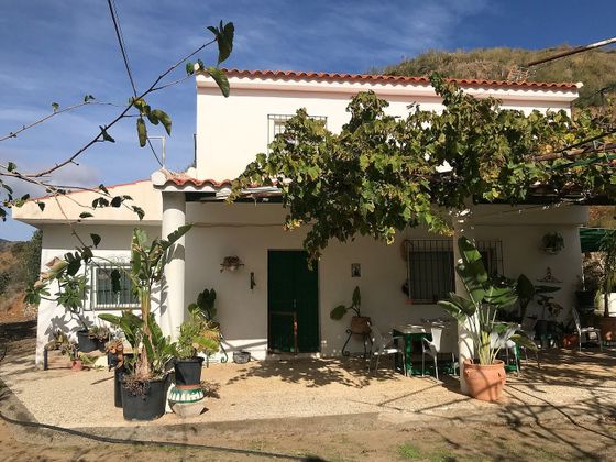 Foto 1 de Casa rural en venta en Casarabonela de 2 habitaciones con jardín y aire acondicionado