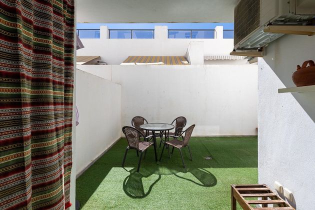 Foto 1 de Venta de piso en Avda. De los Ogíjares de 2 habitaciones con terraza y piscina