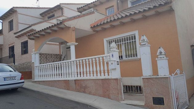 Foto 1 de Venta de casa adosada en calle Rota de 3 habitaciones con terraza y garaje