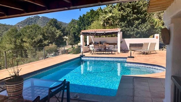 Foto 1 de Casa rural en venda a Santa Eulalia del Río de 5 habitacions amb terrassa i piscina