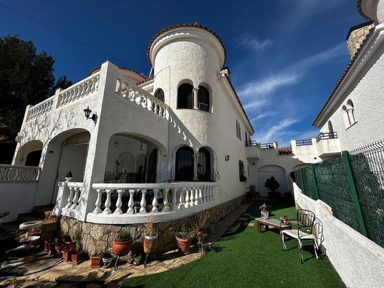 Foto 1 de Casa en venda a Miami Platja - Miami Playa de 3 habitacions amb terrassa i garatge
