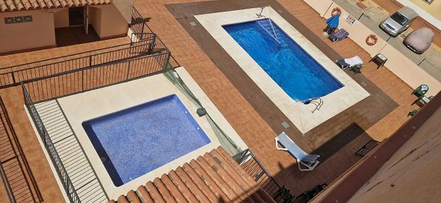 Foto 1 de Piso en venta en calle Higuera de 3 habitaciones con terraza y piscina