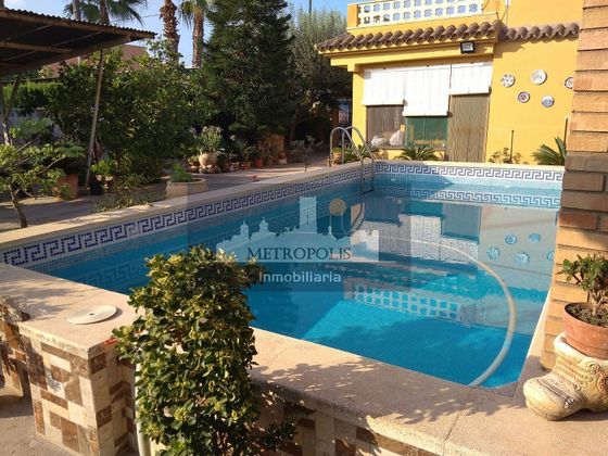 Foto 2 de Venta de chalet en Zona Playa de 5 habitaciones con terraza y piscina
