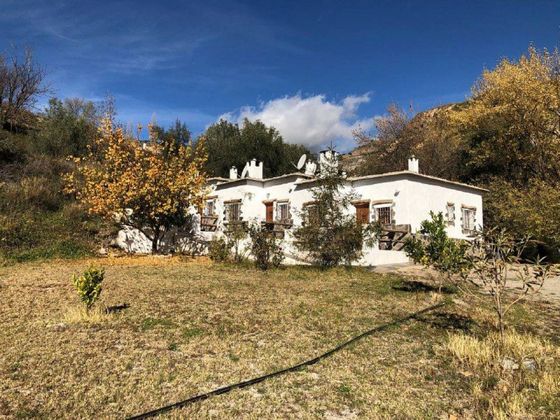 Foto 1 de Casa en venta en Alpujarra de la Sierra de 9 habitaciones con terraza y piscina