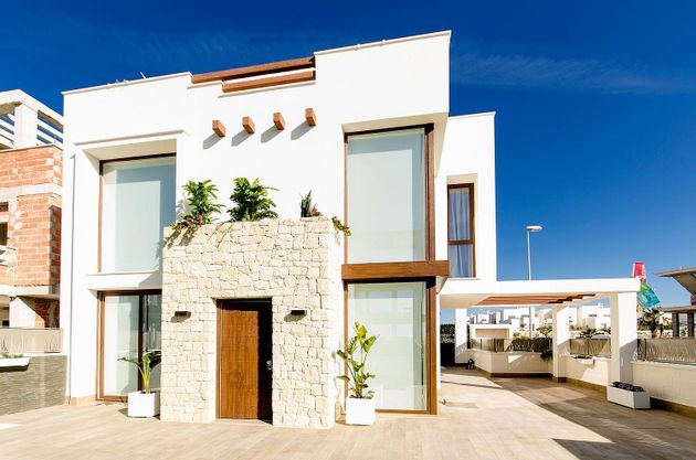 Foto 1 de Casa en venda a Cala Marqués de 3 habitacions amb terrassa i piscina