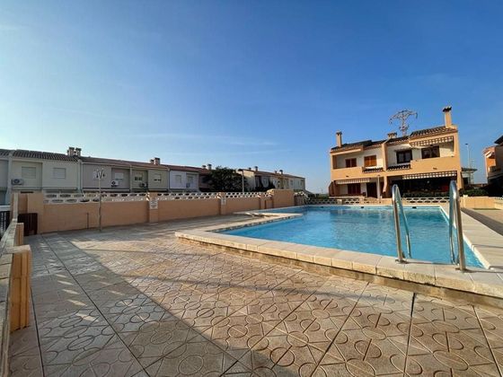 Foto 2 de Casa en venda a El Perellonet de 5 habitacions amb terrassa i piscina