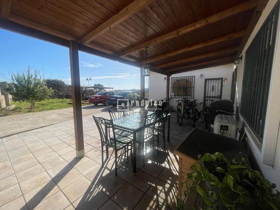 Foto 1 de Casa en venda a Benaguasil de 6 habitacions amb piscina i jardí