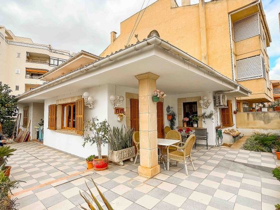 Foto 1 de Casa adosada en venta en calle Mare de Déu del Carme de 3 habitaciones con terraza y garaje