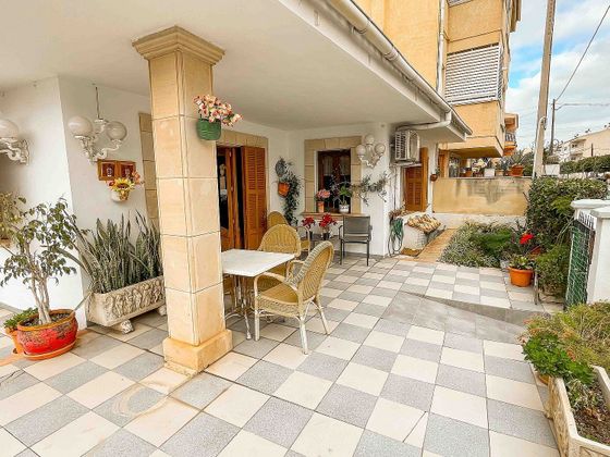 Foto 2 de Casa adosada en venta en calle Mare de Déu del Carme de 3 habitaciones con terraza y garaje