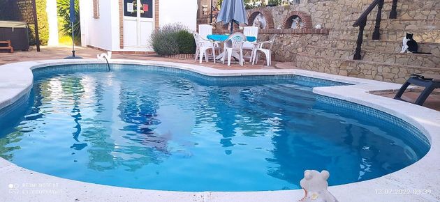 Foto 1 de Casa en venda a Villanueva de la Concepción de 6 habitacions amb terrassa i piscina
