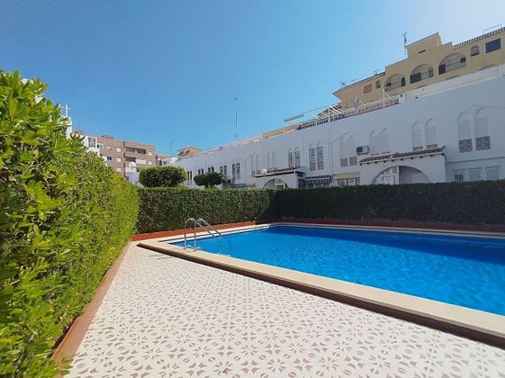 Foto 2 de Venta de casa en Torrelamata - La Mata de 3 habitaciones con terraza y piscina