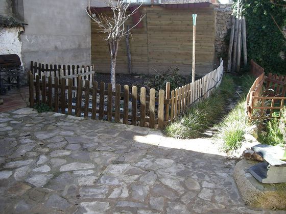 Foto 1 de Venta de casa adosada en Palomares del Campo de 4 habitaciones con terraza y jardín