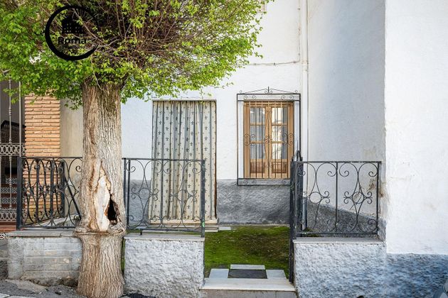 Foto 1 de Casa adossada en venda a Cogollos de la Vega de 6 habitacions amb terrassa i jardí