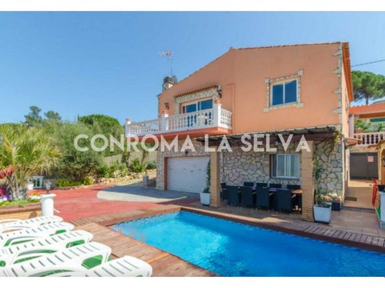 Foto 1 de Chalet en venta en Vidreres de 5 habitaciones con terraza y piscina