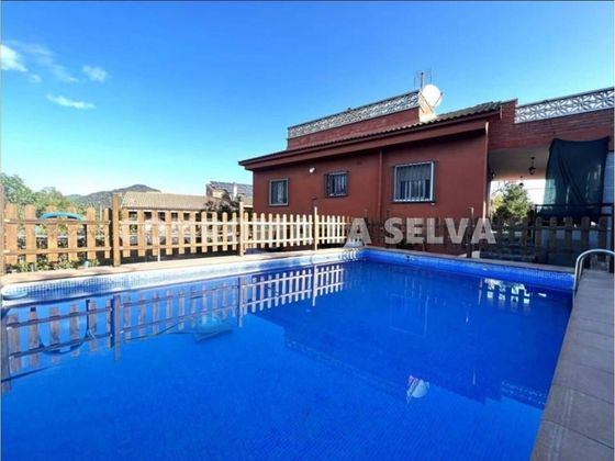Foto 1 de Casa en venda a Riudarenes de 5 habitacions amb terrassa i piscina