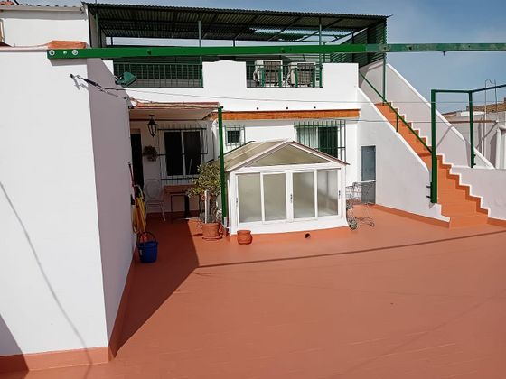 Foto 1 de Casa adossada en venda a Palmete de 4 habitacions i 237 m²