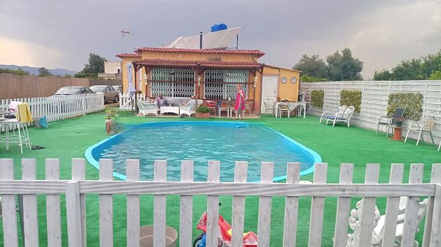 Foto 1 de Chalet en venta en Zona Piscinas de 3 habitaciones con terraza y piscina