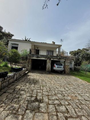 Foto 1 de Xalet en venda a Villa del Prado de 6 habitacions amb terrassa i jardí