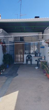 Foto 1 de Casa adosada en venta en calle Olimpia de 3 habitaciones con terraza