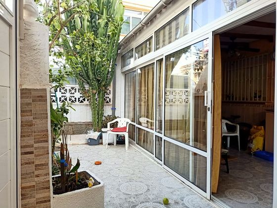 Foto 1 de Casa adossada en venda a calle Murillo de 3 habitacions amb terrassa i jardí