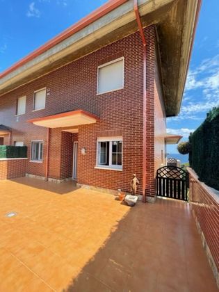 Foto 1 de Casa adossada en venda a carretera Cerdigo de 4 habitacions amb terrassa i garatge