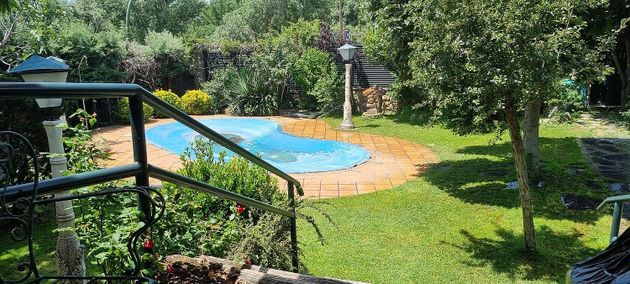 Foto 1 de Casa en venda a Alpedrete de 5 habitacions amb terrassa i piscina