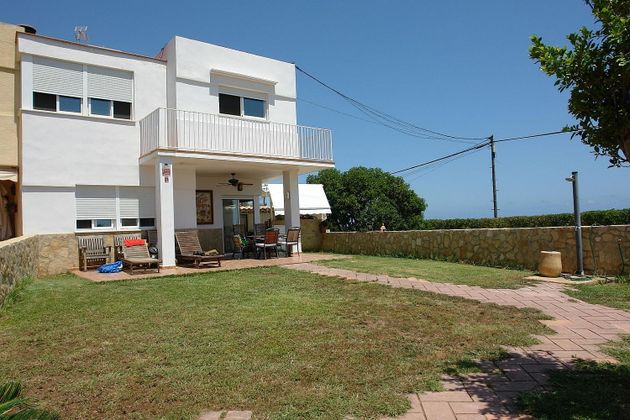 Foto 1 de Casa adossada en venda a Puig ciudad de 2 habitacions amb terrassa i piscina