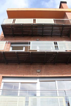 Foto 1 de Casa adossada en venda a urbanización Sant Quirze de 4 habitacions amb terrassa i piscina