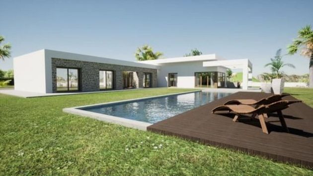 Foto 1 de Casa en venda a Pedreguer de 3 habitacions amb terrassa i piscina