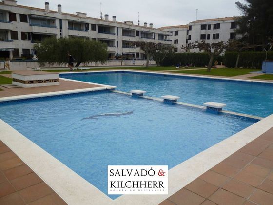 Foto 1 de Piso en venta en avenida De Les Oliveres de 3 habitaciones con piscina y jardín