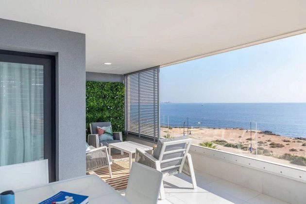 Foto 1 de Piso en venta en Playa Flamenca - Punta Prima de 2 habitaciones con terraza y piscina