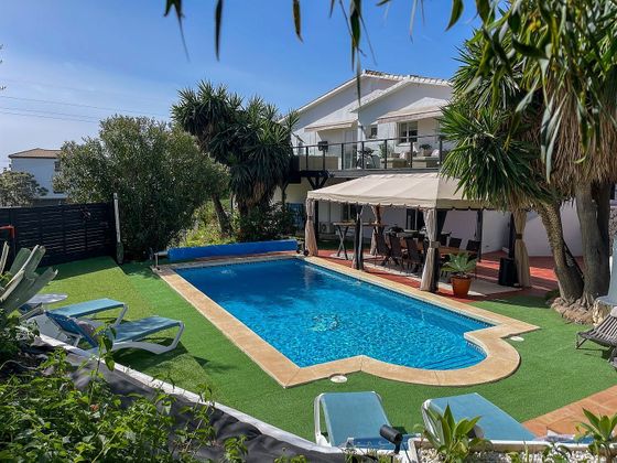 Foto 1 de Chalet en venta en Torreblanca del Sol de 4 habitaciones con terraza y piscina