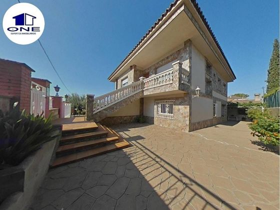 Foto 1 de Venta de casa en calle Del Falcó de 5 habitaciones con terraza y garaje