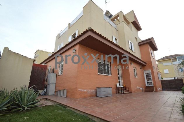 Foto 1 de Venta de casa en Castilleja de la Cuesta de 4 habitaciones con terraza y piscina