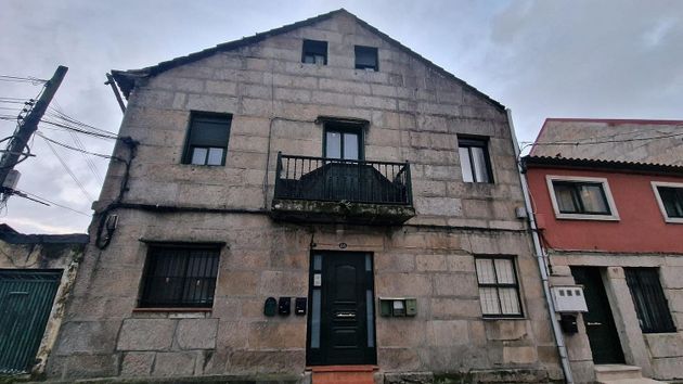 Foto 1 de Casa en venda a Bouzas - Coia de 2 habitacions amb balcó
