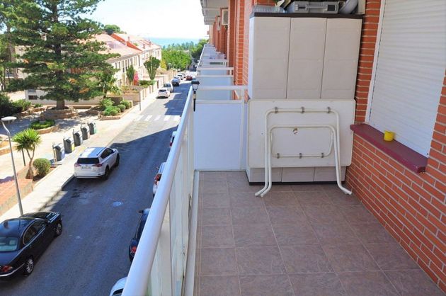 Foto 1 de Piso en venta en calle Del Músic Amela de 2 habitaciones con terraza y piscina