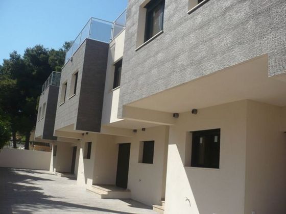Foto 1 de Casa adossada en venda a Miami Platja - Miami Playa de 2 habitacions amb terrassa
