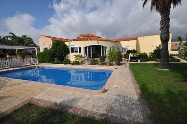 Foto 1 de Xalet en venda a Miami Platja - Miami Playa de 3 habitacions amb terrassa i piscina