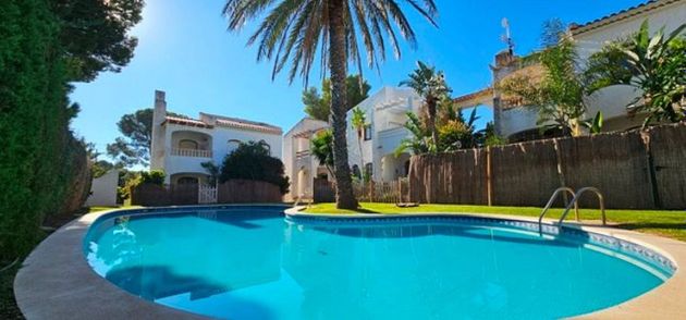 Foto 1 de Casa en venta en Miami Platja - Miami Playa de 2 habitaciones con terraza y piscina