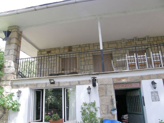 Foto 1 de Venta de chalet en Manzanares el Real de 6 habitaciones con terraza y garaje