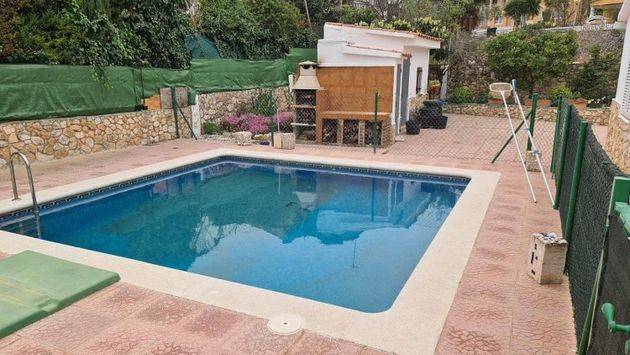 Foto 1 de Chalet en venta en Pobla de Montornès, la de 5 habitaciones con terraza y piscina